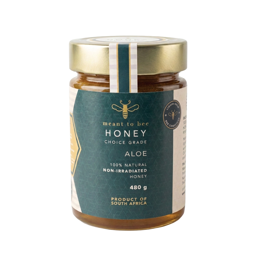 A glass jar of Meant To Bee Aloe honey with a gold lid and deep green label.